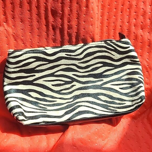 White House Black Market Zebra Pront Clutch - Picture 1 of 6